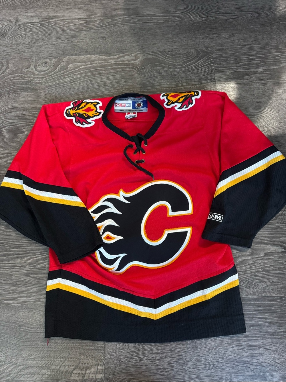 CCM Calgary Flames Kids Hockey Jersey in Red, Black & Gold